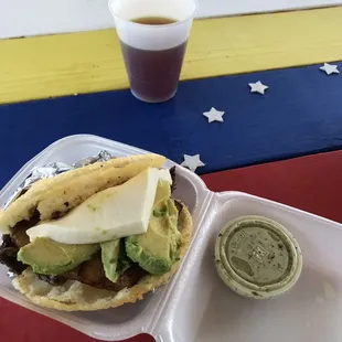 I think it was called the El Rey Arepa, it had grilled beef, avocado, cheese and fried banana.