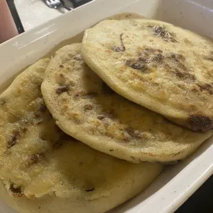 * Bean and cheese pupusa  * Revueltas pupusa * Asada con Quezo pupusa