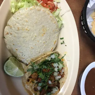 Gordita $2.50 and $1.00 taco a pastor