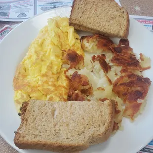 Eggs with cheese, hashbrowns, and wheat toast