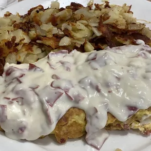 Corned Beef Hash Omelette topped with cream Homemade Chipped Beef.....my favorite creation