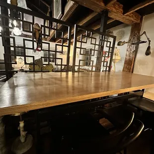 a wooden table and chairs