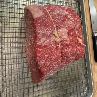 Trimmed and tied local top round.