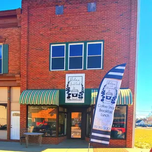 the front of a brick building