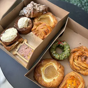 a variety of pastries in a box