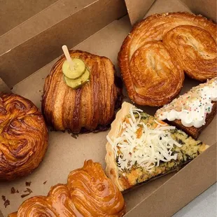 a variety of pastries in a box