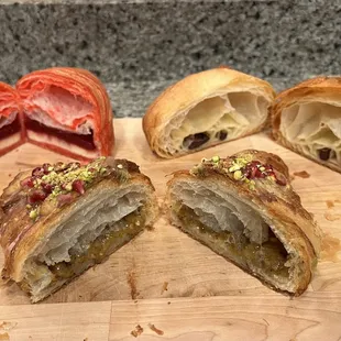 a variety of pastries on a cutting board