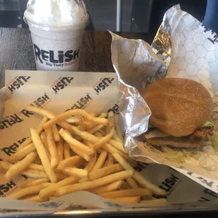 Turkey burger with fries and milkshakes with all 4 flavors mix together.