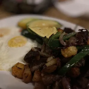 Short rib hash with eggs over medium