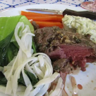A Surf &amp; Turf style dinner I preprd 4 my Mom&apos;s Mother&apos;s Day gala.  My plate: Marinated Filet Mignon, Cod Sitka, Sesame Oiled Bok Choy-Noodle