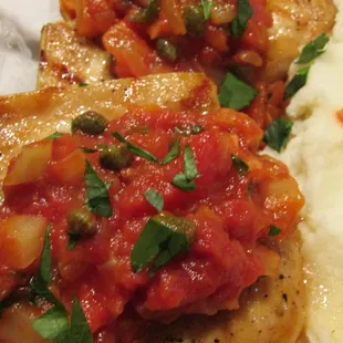 Swordfish Provencal over Mashed Potatoes.