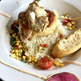 Crab on Crab on Crab-Local softshell crab, jumbo lump crab cake, topped with local crab meat, w/corn relish, lime aioli &amp; jasmine rice