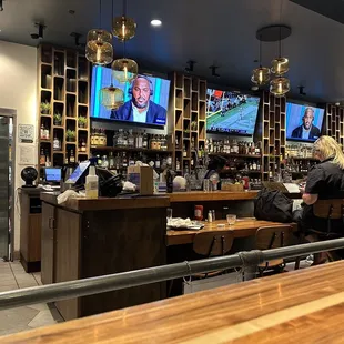 people sitting at the bar