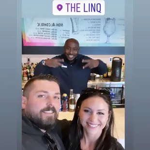 a man and a woman posing for a picture