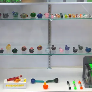an assortment of glass pipes.