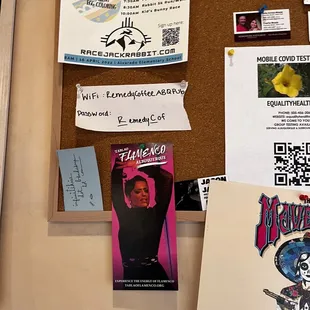 a cork board with a bunch of items on it