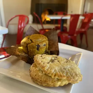 Vegan pumpkin chocolate chip muffin &amp; Vegan red pepper pastry.