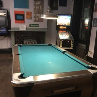 Renewed pool table and clean floors!