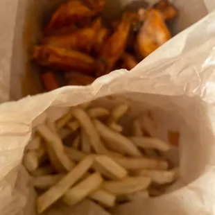french fries in a paper bag