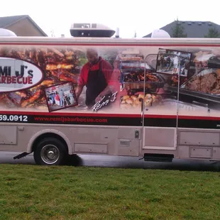 a food truck parked in front of a house