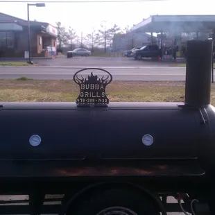 a grill on the side of the road