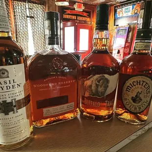 a selection of bottles of bourbon