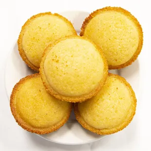 a plate of lemon muffins