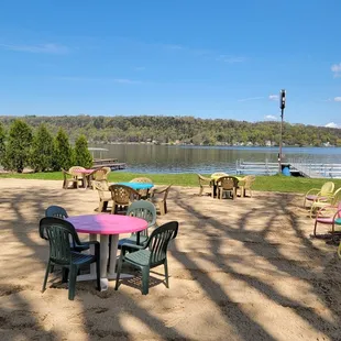 Sitting outdoors in the sand by the famous Tiki Hut at Remi's Thirsty Moose!