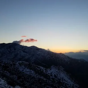 pink and yellow setting over the mountain