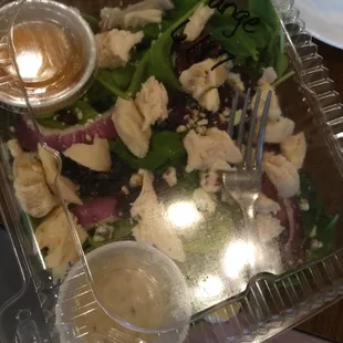 Spinach salad with chicken, oranges, crisis, onions, cheese.  Very fresh!