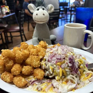 Breakfast of champions!! Chili Size with tater tots or should I say tater tots with a chili size on the side.  It was delicious!