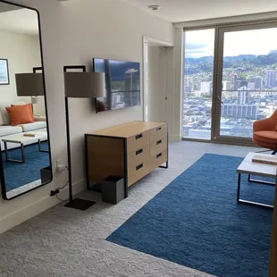 Standing by the countertop looking at the city view