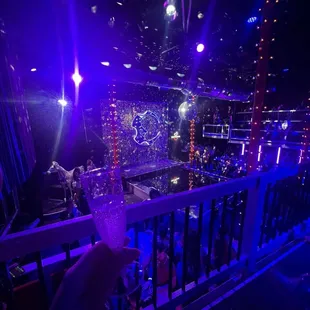 a person holding a glass of champagne