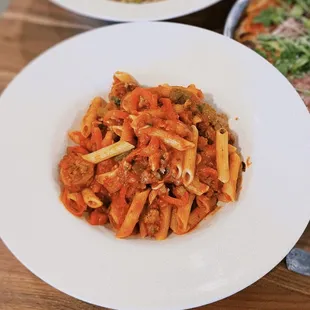 Penne con salsiccia / $11