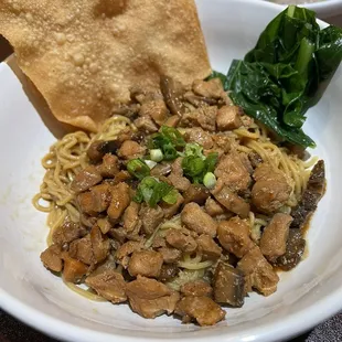 F5. Bakmi Ayam Bakso comes w/ meatballs in beef broth soup (background)