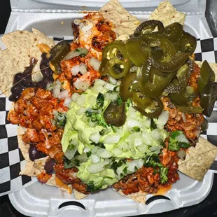mexican food in a styrofoam container