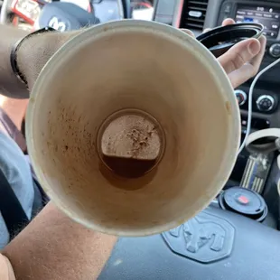 Powder coffee at bottom of the cup