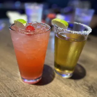 two cocktails on a table