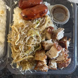 2 item combo with half rice, half pancit, longanisa, and lechon kawali