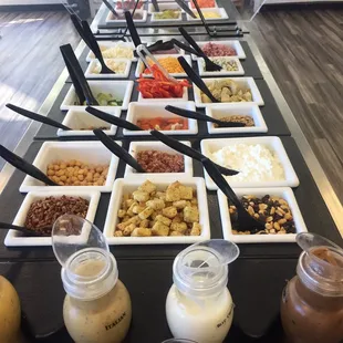 a variety of salads and condiments