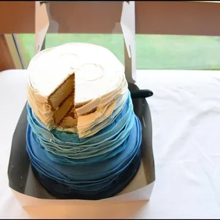 Fancy cake boxed up to go after we cut our ceremonial slice.