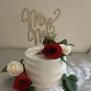 Wedding cake with red velvet and cream cheese frosting. Fresh roses as per my request.