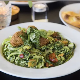 Zoodles primavera with pesto + meatballs
