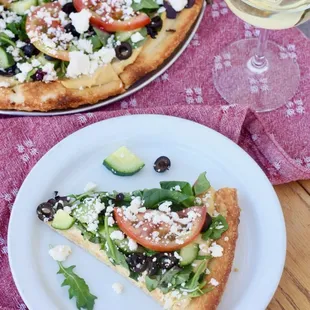 Mideast pizza with hummus. Paired with a nice crisp Sauvignon Blanc
