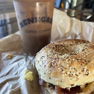 Everything Bagel Bacon Egg and Cheese Breakfast Sandwich w/ a cold brew