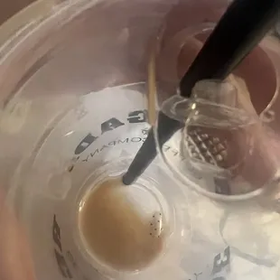 Fake nail in coffee