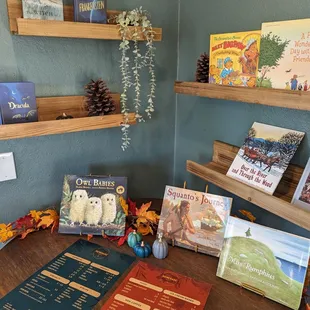 a display of books and stuffed animals