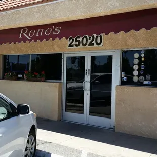 a car parked in front of the restaurant