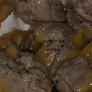 a plate of meat and vegetables