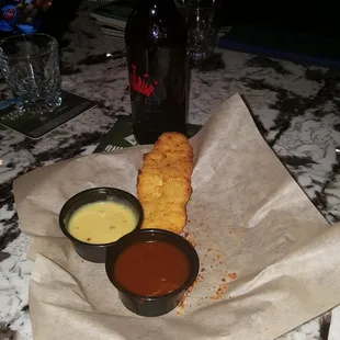Chicken tenders, almost all done..comez with 4 and 1 sauce..customer said they were goooood!